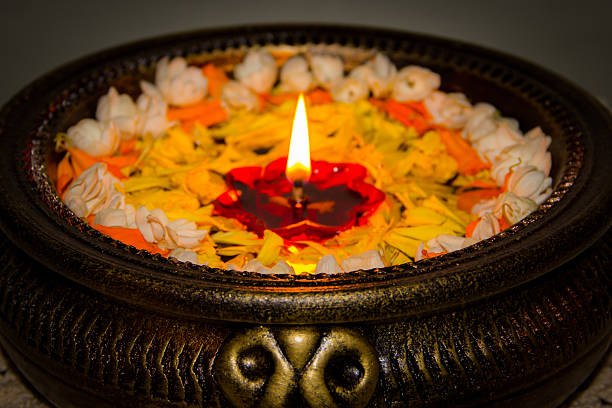 Natural low-smoke fragrance setup for Diwali with essential oil diffuser and dried flower potpourri placed near indoor plants for a safe festive aroma.