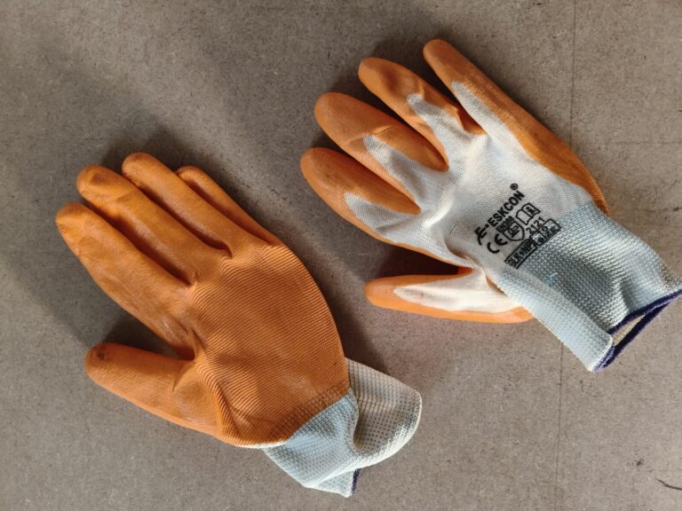 Gardening gloves for container gardening used to protect hands while handling delicate potted plants, soil, and thorny stems safely