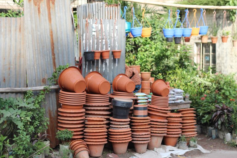 Indian garden shop with clay and plastic pots in different sizes for balcony and terrace container gardening